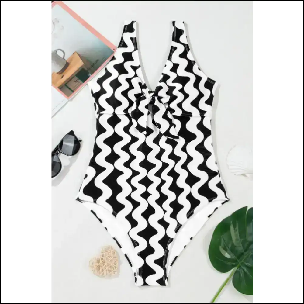 Stripe it Like It’s Hot: Unleash your Inner Siren with our Contrast Striped one Piece! ?️🌊 Piece