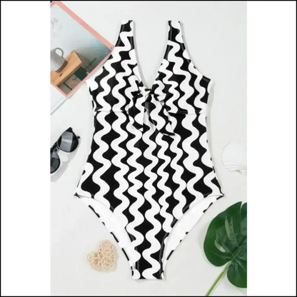 Stripe it Like It’s Hot: Unleash your Inner Siren with our Contrast Striped one Piece! ?️🌊 Piece